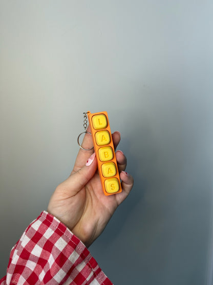 Personalizuotas fidget pakabukas - žaislas