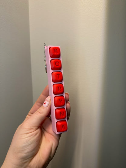 Personalizuotas fidget pakabukas - žaislas