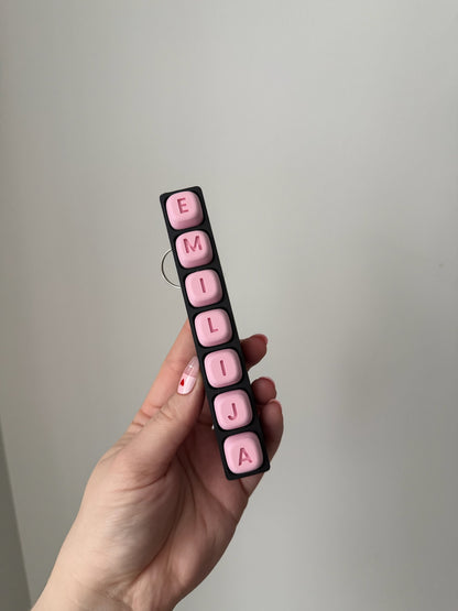 Personalizuotas fidget pakabukas - žaislas